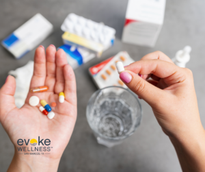 Image of a person with a handful of multi-colored pills explaining what is flexeril used for